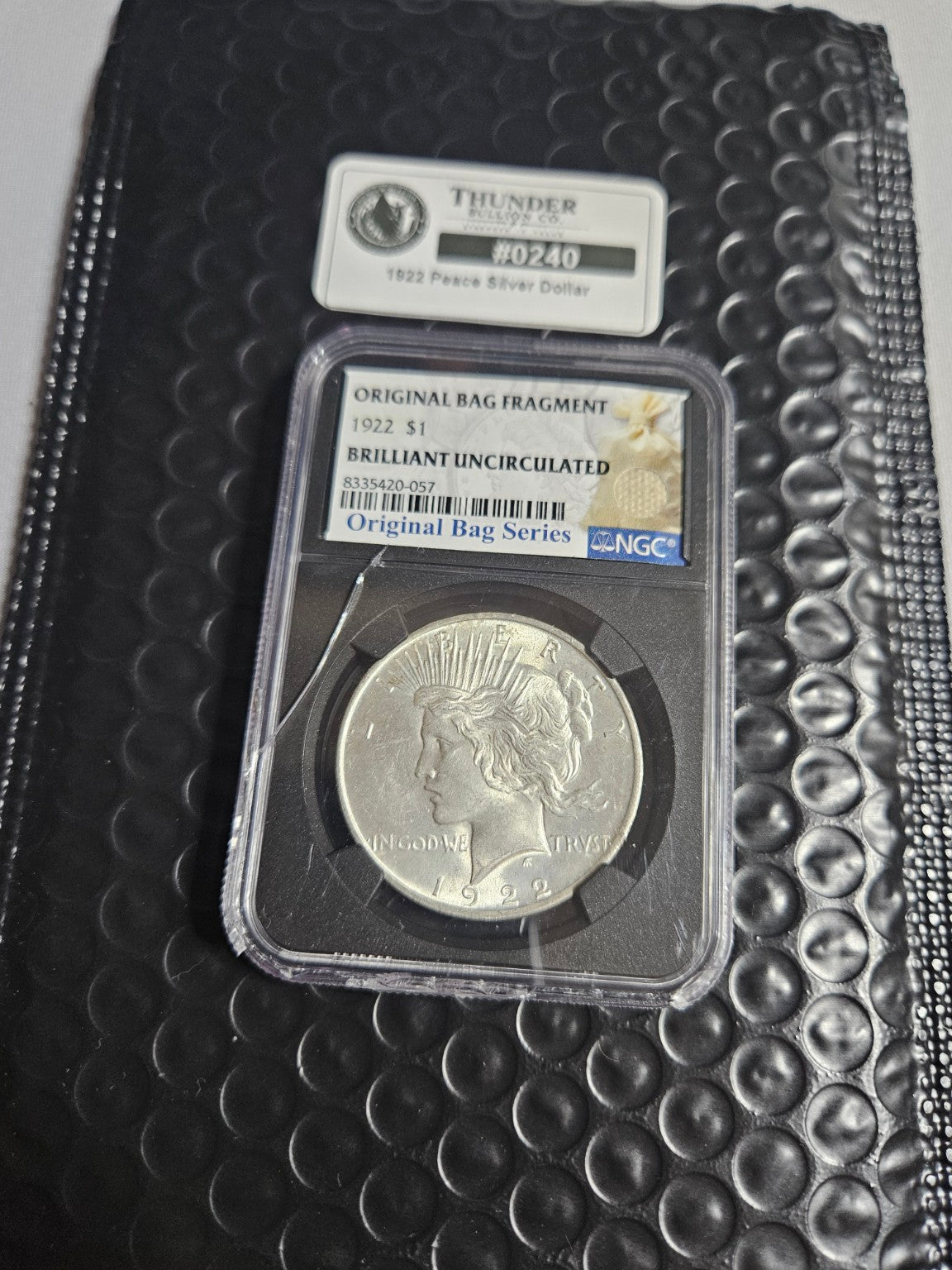 1922 Peace Silver Dollar — NGC Original Bag Series BU - Item 0240