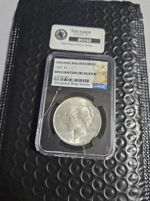 1922 Peace Silver Dollar — NGC Original Bag Series BU - Item 0240