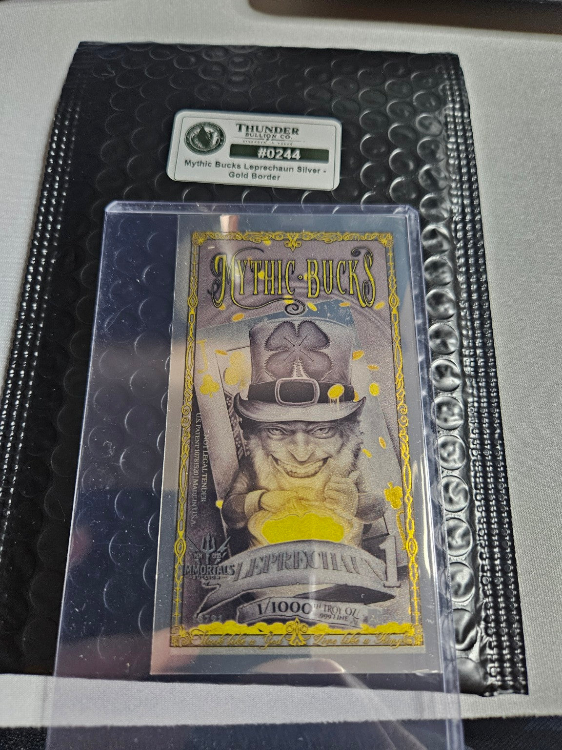 Mythic Bucks Leprechaun Silver — Gold Border - Item 0244